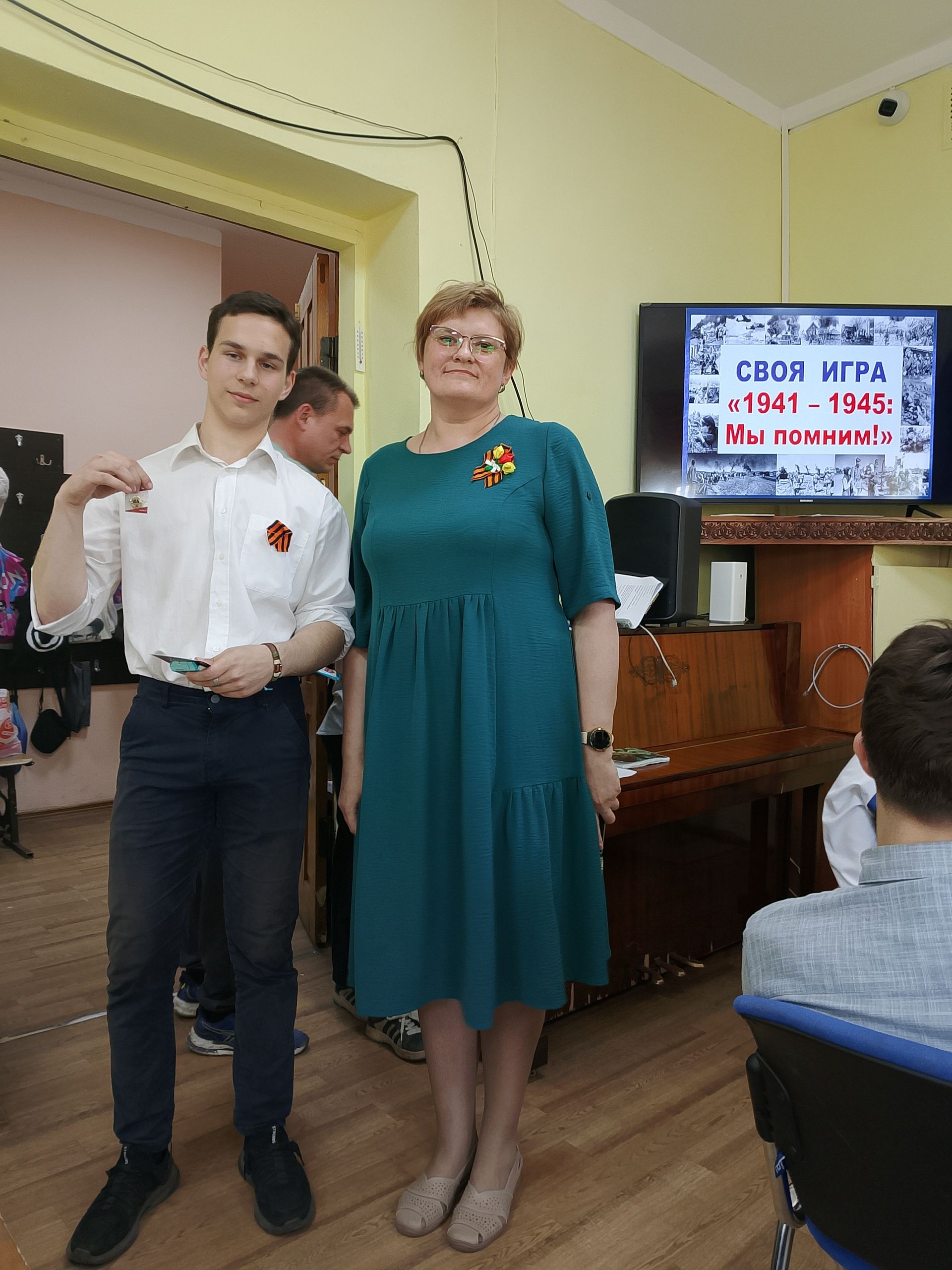 Фото к статье: Знак ГТО на груди у него...